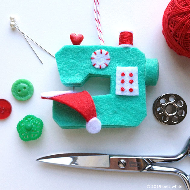 Handmade Christmas Ornament Ideas by popular Utah quilting blog, Diary of a Quilter: image of a felt sewing machine ornament. 