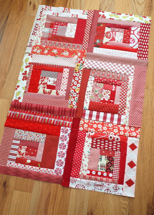 red and white scrappy log cabin blocks