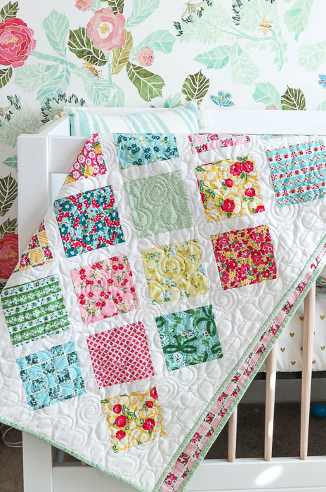 unique pattern bright colors on white Sweet Baby Quilt machine quilted