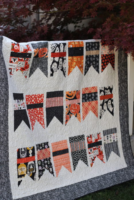 Halloween flags quilt made using Diary of a Quilter Summer Bunting quilt pattern