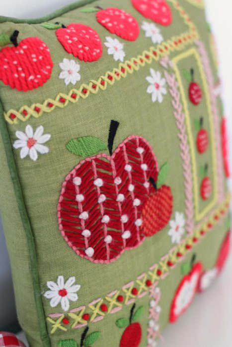 Vintage crewel-work yarn apple-themed throw pillow