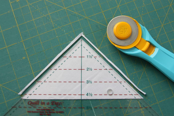 Half Square Triangle Short Cuts featured by top US quilting blog, Diary of a Quilter: Short-cuts for making and squaring-up multiple Half Square Triangle Quilt Blocks at once. Video tips and time-saving tutorial.