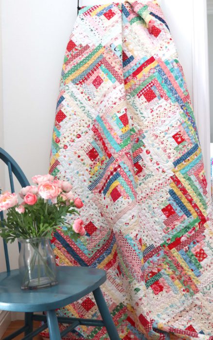 A Year in Review: Looking back at 2019 + Looking forward to 2020 by popular Utah quilting blog: image of a vintage log cabin quilt. 