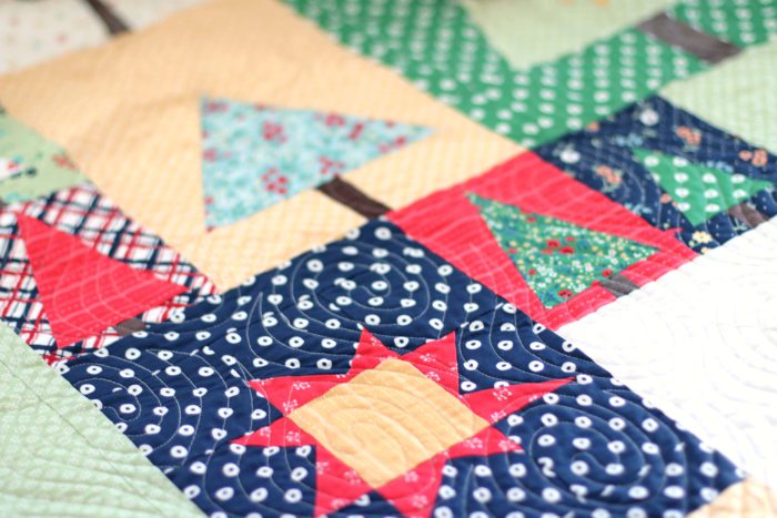Pine Hollow Patchwork Forest Quilt Along Week 4 by popular Utah quilting blog, Diary of a Quilter: image of a patchwork forest quilt. 