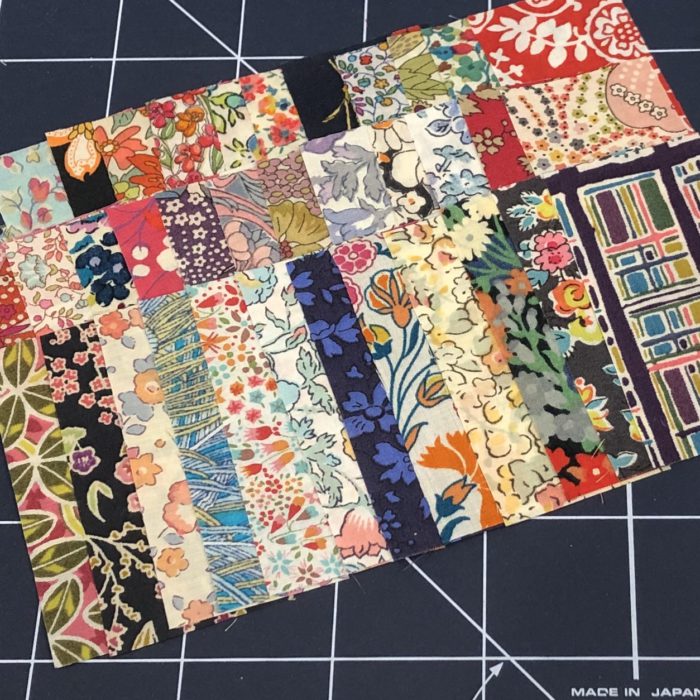 Scrappy Liberty Patchwork Pincushion by Guest May Chappell by popular quilting blog, Diary of a Quilter: image of stitched together Liberty Lawns fabric.