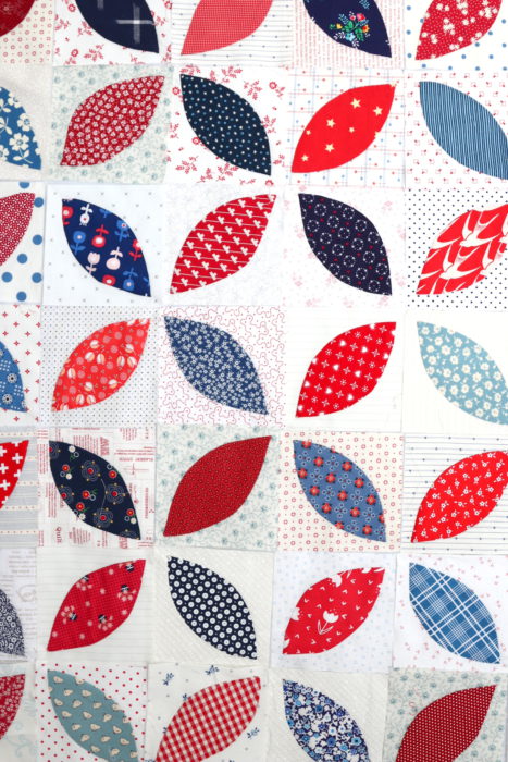 In Search of my Sewing Mojo and Other Tales of Summer by popular sewing blog, Diary of a Quilter: image of a pieced together red, white, and blue block quilt.