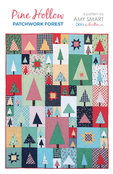 New Patchwork Forest Quilt Pattern: Pine Hollow Version by popular quilting blog, Diary of a Quilter: image of a multi-colored patchwork forest tree quilt by Amy Smart.