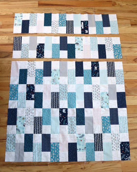 Bricks Baby Quilt Tutorial by popular quilting blog Diary of a Quilter: image of pieced brick units quilting.