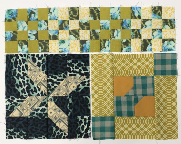 Inspiration from Modern Quilt Shop, Quilt Sandwich Fabrics by popular US quilting blog, Diary of a Quilter: image of green and blue toned quilt blocks.