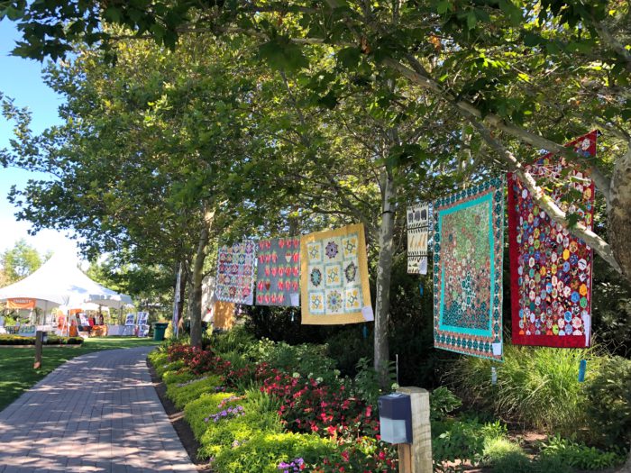 Garden of Quilts 2019 - Thanksgiving Point, Utah by popular quilting blog, Diary of a Quilter: image of quilts display outside in the Ashton Gardens at Thanksgiving Point.