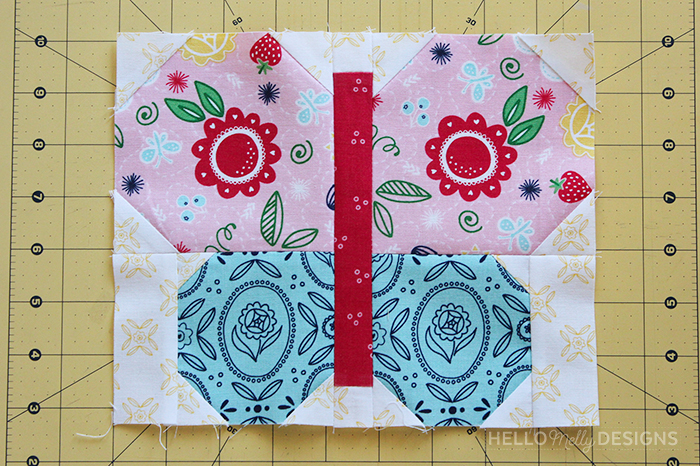 Quilted Butterfly Reading Pillow by Guest Host Melanie Collette by popular quilting blog, Diary of a Quilter: image of a fabric butterfly.