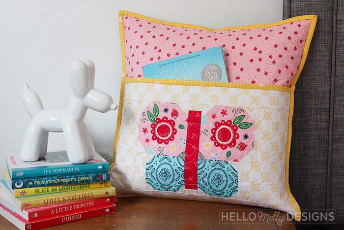 Quilted Butterfly Reading Pillow by Guest Host Melanie Collette by popular quilting blog, Diary of a Quilter: image of quilted butterfly reading pillow.