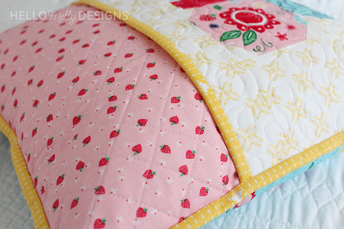 Quilted Butterfly Reading Pillow by Guest Host Melanie Collette by popular quilting blog, Diary of a Quilter: image of quilted butterfly reading pillow.