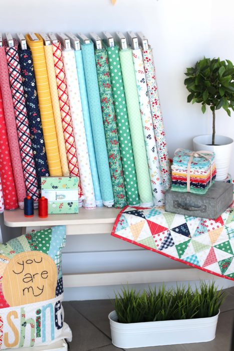 Sugarhouse Park Fabric Collection by Amy Smart by popular Utah quilting blog, Diary of a Quilter: image of Sugarhouse Park fabric bolts, fat quarters, and bundles.