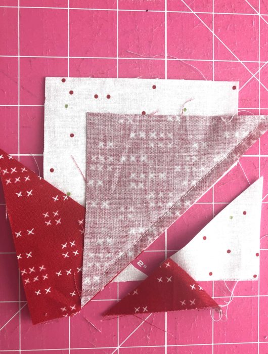 Adding points to Wonky Star Quilt Block | Pine Hollow Patchwork Forest Quilt Along Week 4 by popular Utah quilting blog, Diary of a Quilter: image of fabric for wonky star quilt block. 