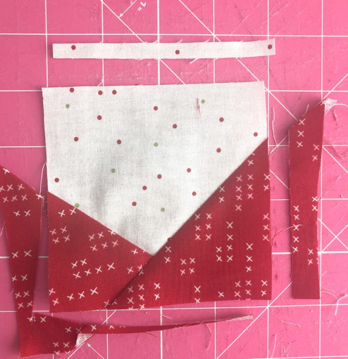 Squaring up points on Wonky Star Quilt Blocks | Pine Hollow Patchwork Forest Quilt Along Week 4 by popular Utah quilting blog, Diary of a Quilter: image of fabric for wonky star quilt block. 
