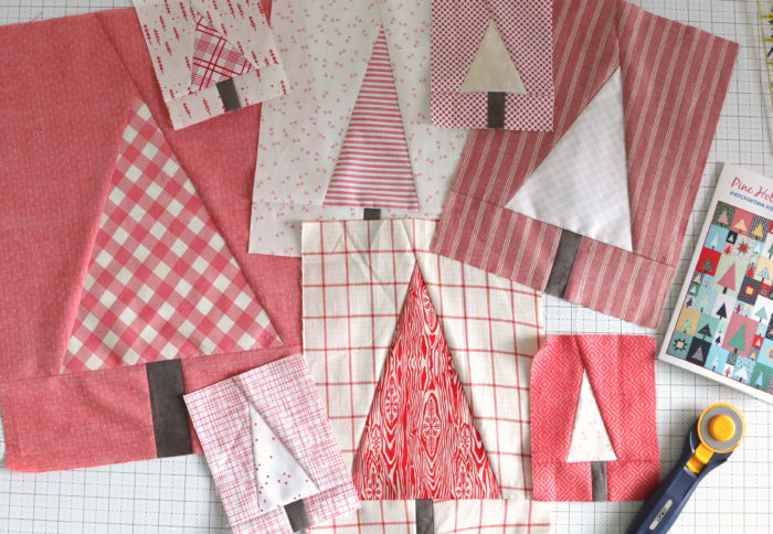 Pine Hollow Quilt Along Week 5 by popular quilting blog, Diary of a Quilter: image of large tree quilting blocks.