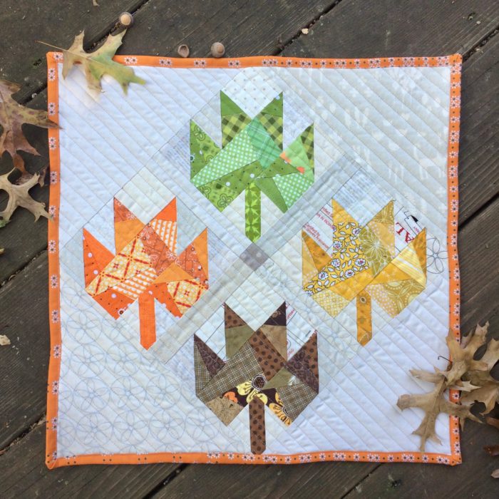 Scrappy Maple Leaf Quilt Pattern Tutorial by guest writer Leila Gardunia by popular quilting blog, Diary of a Quilter: image of scrappy maple leaf quilt. 