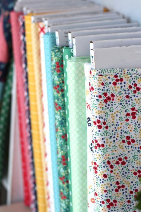 Low Volume prints Sugarhouse Park | Sugarhouse Park Fabric Collection by Amy Smart by popular Utah quilting blog, Diary of a Quilter: image of bolts of Sugarhouse Park fabric. 
