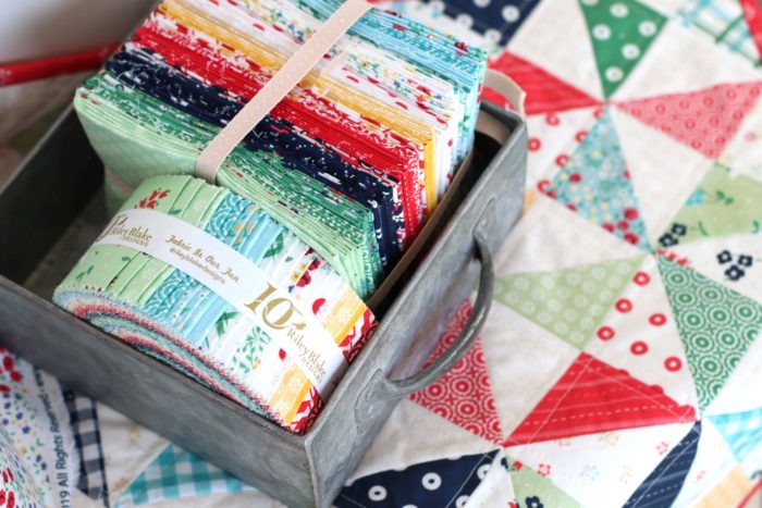 Sugarhouse Park Fabric Collection by Amy Smart by popular Utah quilting blog, Diary of a Quilter: image of a Sugarhouse Park fat quarter bundle and jelly roll.