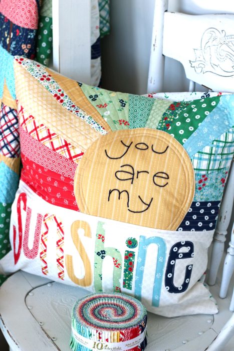 Sugarhouse Park Fabric Collection by Amy Smart by popular Utah quilting blog, Diary of a Quilter: image of a pillow made out of Sugarhouse Park fabric.