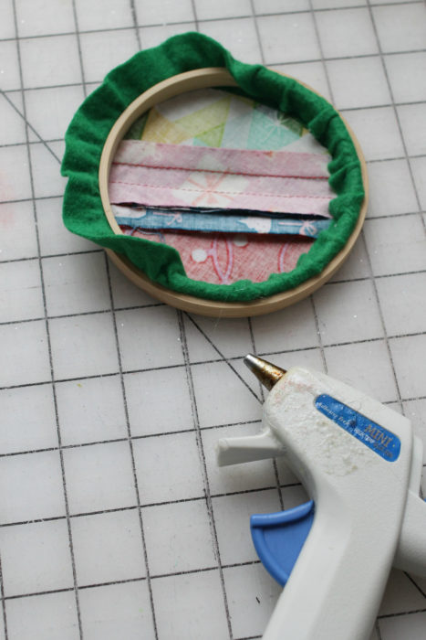 Felt Tree Ornament Tutorial by guest Stephanie of Swoodson Says by popular quilting blog, Diary of a Quilter: image of tree inset inside a small embroidery hoop. 