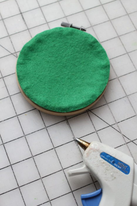 Felt Tree Ornament Tutorial by guest Stephanie of Swoodson Says by popular quilting blog, Diary of a Quilter: image of green felt backing for the felt ornament.