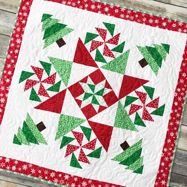Meet updated Fort Worth Fabric Studio + Giveaway by popular Utah quilting blog, Diary of a Quilter: image of a Christmas mystery quilt.