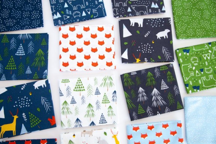  Snow-capped Mountain Quilt Block Tutorial by popular Utah quilting blog, Diary of a Quilter: image of various fabric squares from The Forest Fabric line. 