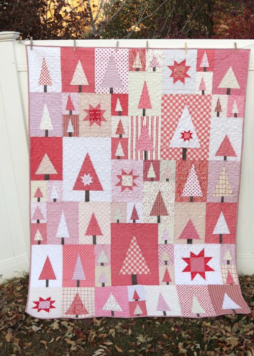 Pine Hollow Patchwork Forest Quilt, a Christmas Quilt featured by top US quilting blog, Diary of a Quilter