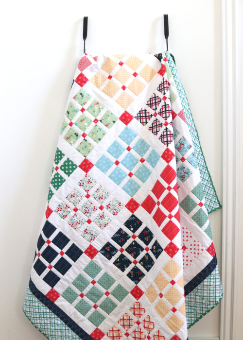 New 10" Precut Quilt Pattern for Prep School Picnic by popular Utah quilting blog, Diary of a Quilter: image of a Layer Cake Prep School Picnic quilt.