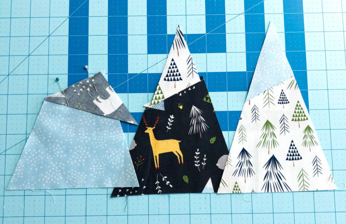  Snow-capped Mountain Quilt Block Tutorial by popular Utah quilting blog, Diary of a Quilter: image of fabric cut in the shape of mountains. 