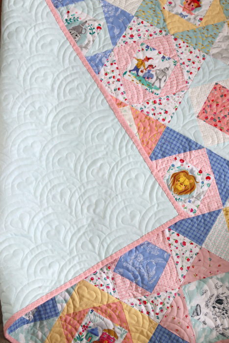 Rainbow Heart edge to edge machine quilting