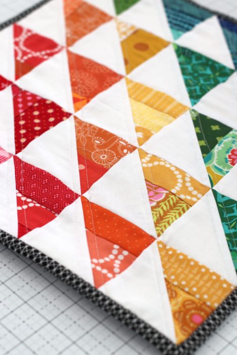 Half Square triangle scrap mini quilt by Amy Smart