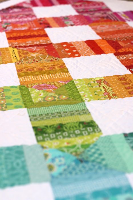 Use fabric scraps - spectrum quilt by Amy Smart