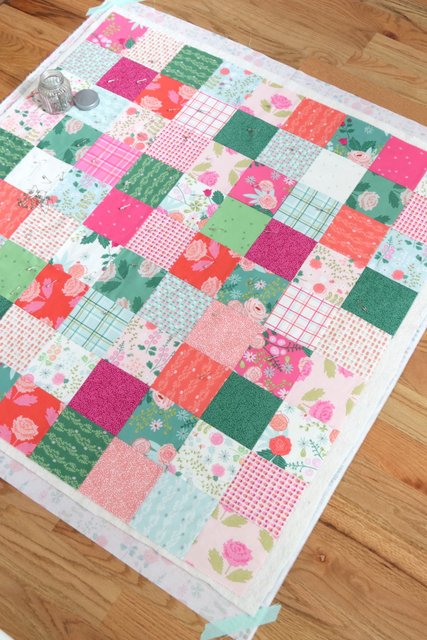 How to Make a Patchwork Baby Quilt with Precuts, a tutorial featured by top US quilting blogger, Diary of a Quilter