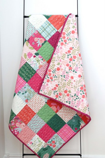 How to Make a Patchwork Baby Quilt with Precuts, a tutorial featured by top US quilting blogger, Diary of a Quilter