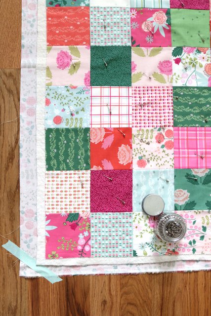 How to Make a Patchwork Baby Quilt with Precuts, a tutorial featured by top US quilting blogger, Diary of a Quilter