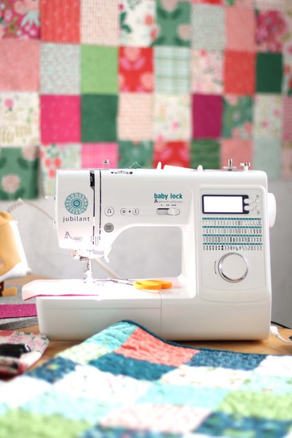 How to Make a Patchwork Baby Quilt with Precuts, a tutorial featured by top US quilting blogger, Diary of a Quilter