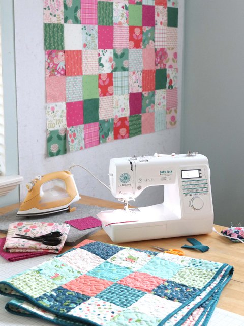 How to Make a Patchwork Baby Quilt with Precuts, a tutorial featured by top US quilting blogger, Diary of a Quilter