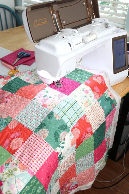 How to Make a Patchwork Baby Quilt with Precuts, a tutorial featured by top US quilting blogger, Diary of a Quilter