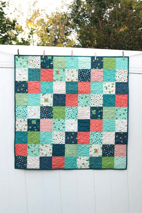 How to Make a Patchwork Baby Quilt with Precuts, a tutorial featured by top US quilting blogger, Diary of a Quilter