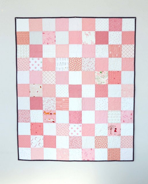 Pink and White Checkerboard patchwork quilt by Amy Smart
