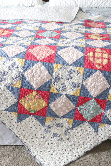 Queen Size quilt variation of Palace Court - featuring Notting Hill fabric