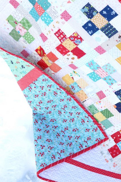 Scrap quilt pattern featuring Sugarhouse Park fabric by Amy Smart