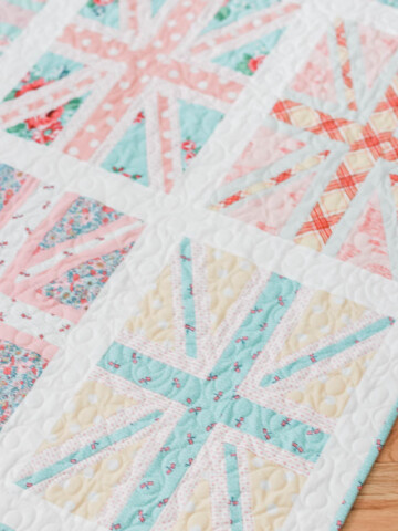 Union Jack pastel baby quilt featuring Notting Hill and Liberty of London