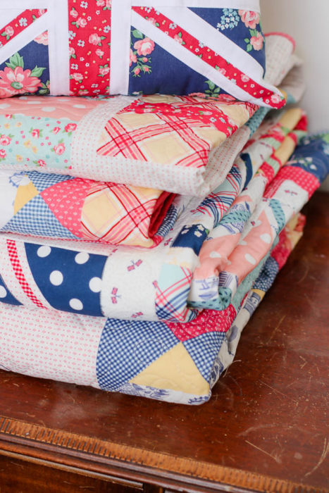 Stack of Notting Hill quilts by Amy Smart