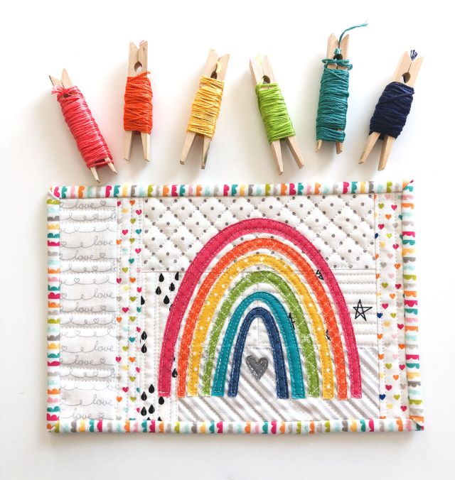Free Applique Rainbow mini quilt pattern from Ameroonie Desigsn