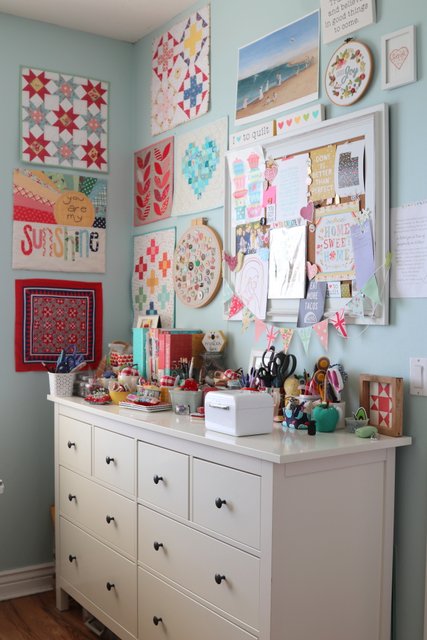Mini Quilts hanging in a sewing room