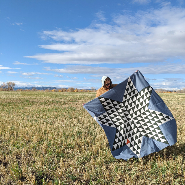 Free Pattern – Modern take on a traditional Half-Square Triangle Star Quilt designed by Lindlee of Plains & Pine